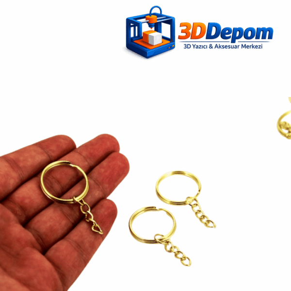 25 mm Altın Kaplama Anahtarlık Halkası Boyut ve Kullanım Detayı. Avuç içinde sergilenen 25 mm altın sarısı prestij zincirli anahtarlık halkası ölçek görünümü.